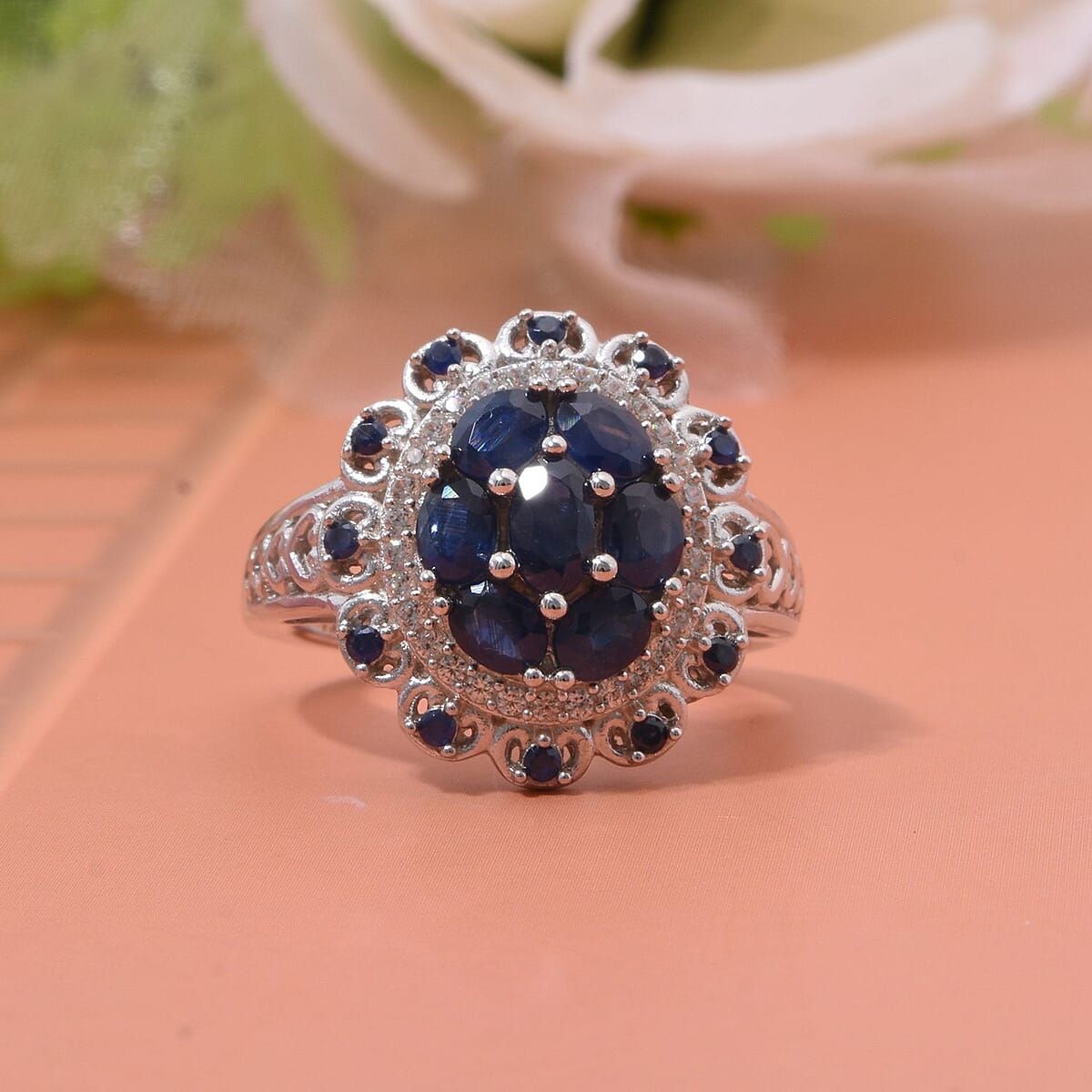 Kanchanaburi Blue Sapphire and White Zircon 2.25 ctw Cluster Halo Ring in Rhodium Over Sterling Silver (Size 7.0) image number 1