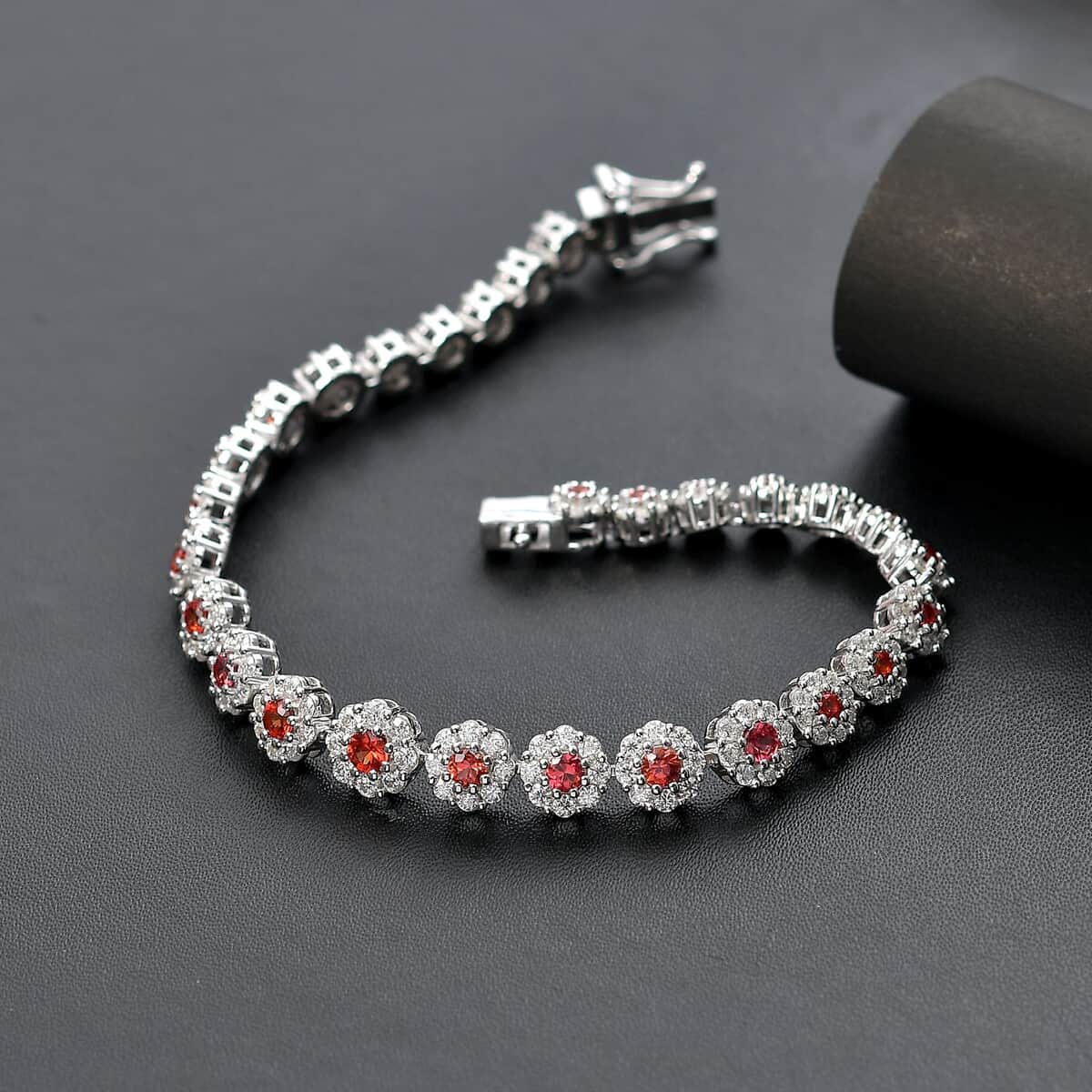 Premium Red Sapphire and Moissanite 7.10 ctw Floral Halo Bracelet in Rhodium Over Sterling Silver (7.25 In) (Del. in 10-12 Days) image number 1