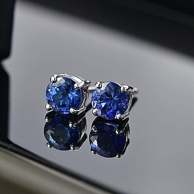 AAA Tanzanite 1.50 ctw Solitaire Stud Earrings in Rhodium Over Sterling Silver