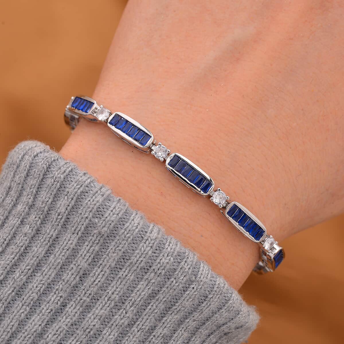 Simulated Blue and White Diamond Bracelet in Silvertone (7.75 In) image number 1