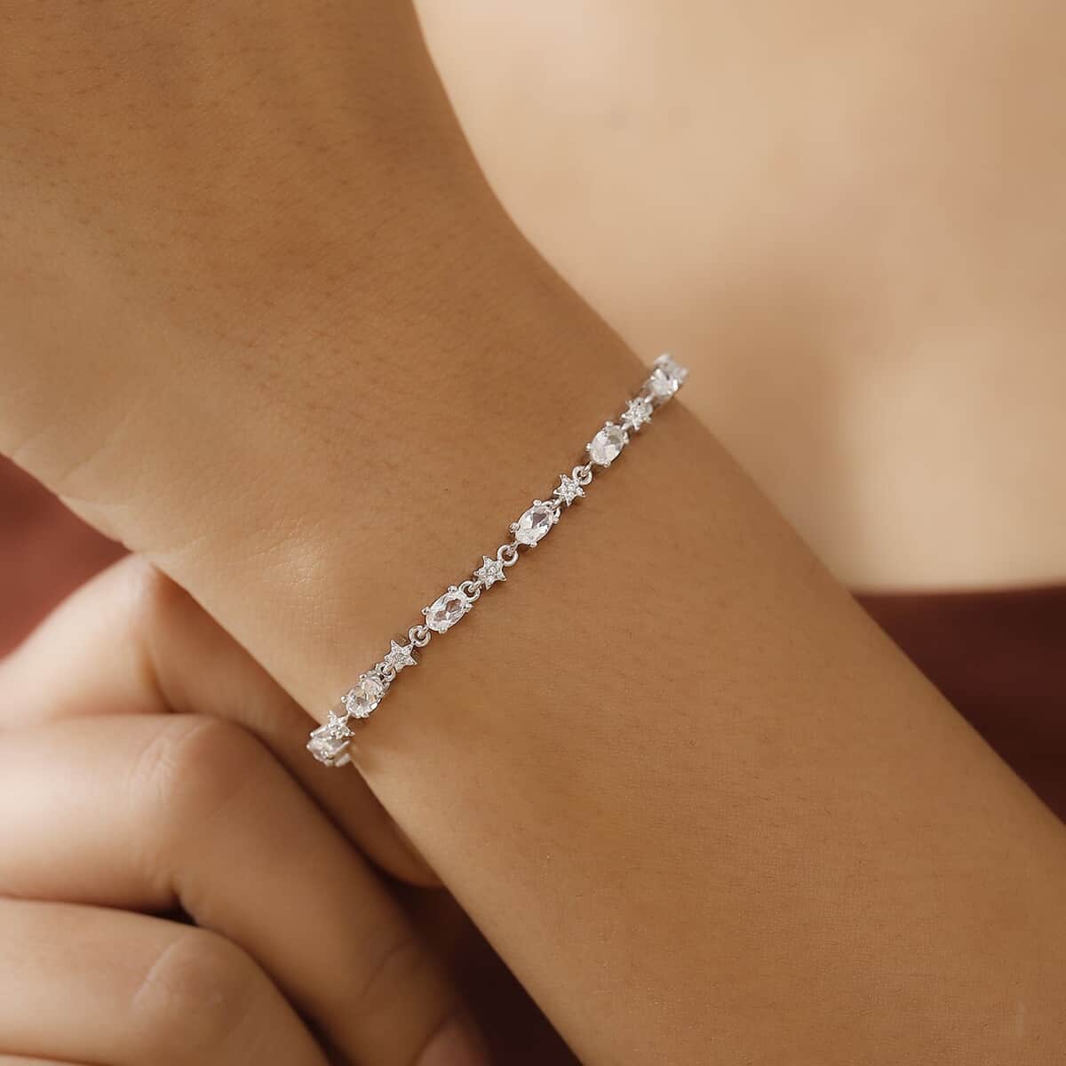 Premium Malagasy Moonstone and Moissanite 3.50 ctw Celestial Bracelet in Rhodium Over Sterling Silver (6.50 In) image number 2