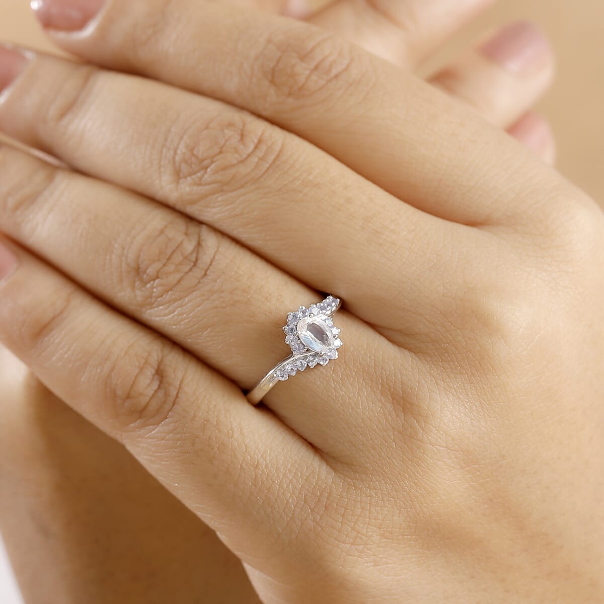 Premium Malagasy Moonstone and Tanzanite 0.75 ctw Bypass Sunburst Ring in Rhodium Over Sterling Silver (Size 7.0) image number 2