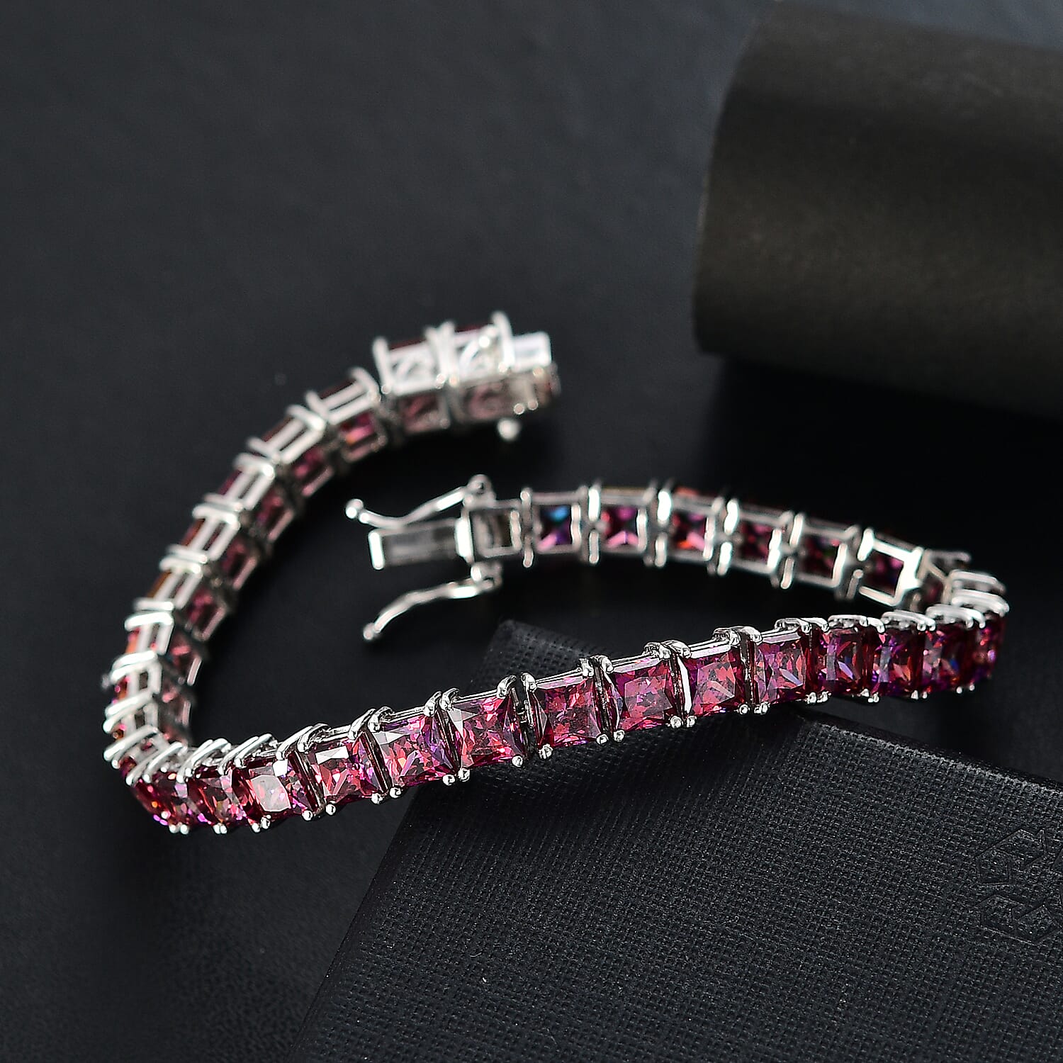 J Francis Embellished with Dark Red Zirconia by Swarovski 44.40 ctw Iconic Tennis Bracelet in Rhodium Over Sterling Silver (7.25 In)