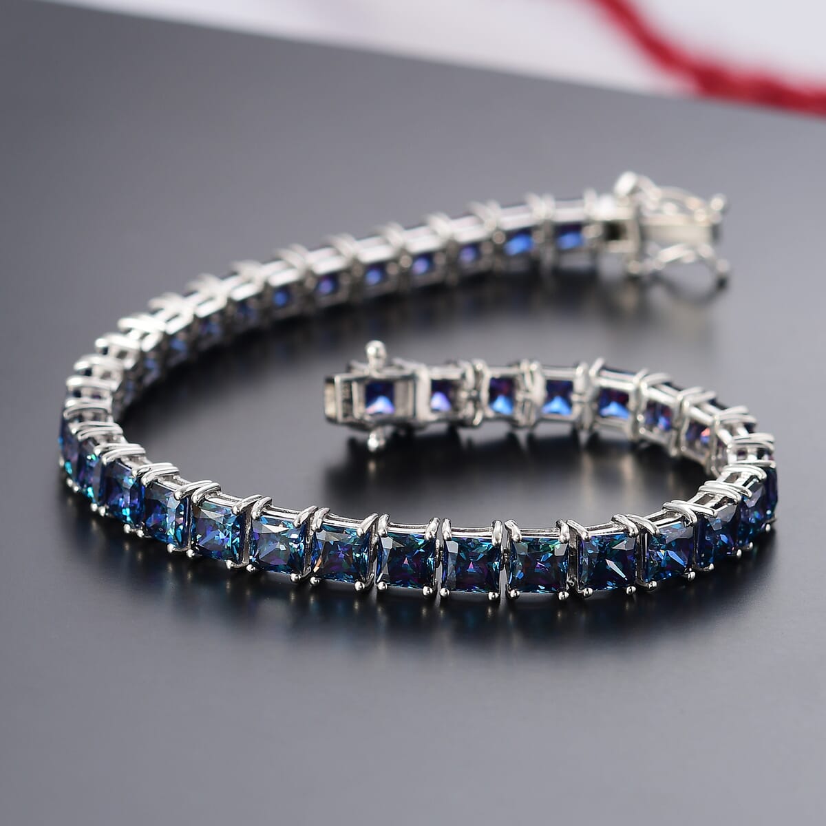 J Francis Embellished with Red Dark Zirconia by Swarovski 49.80 ctw Bracelet in Rhodium Over Sterling Silver (8.00 In) image number 1