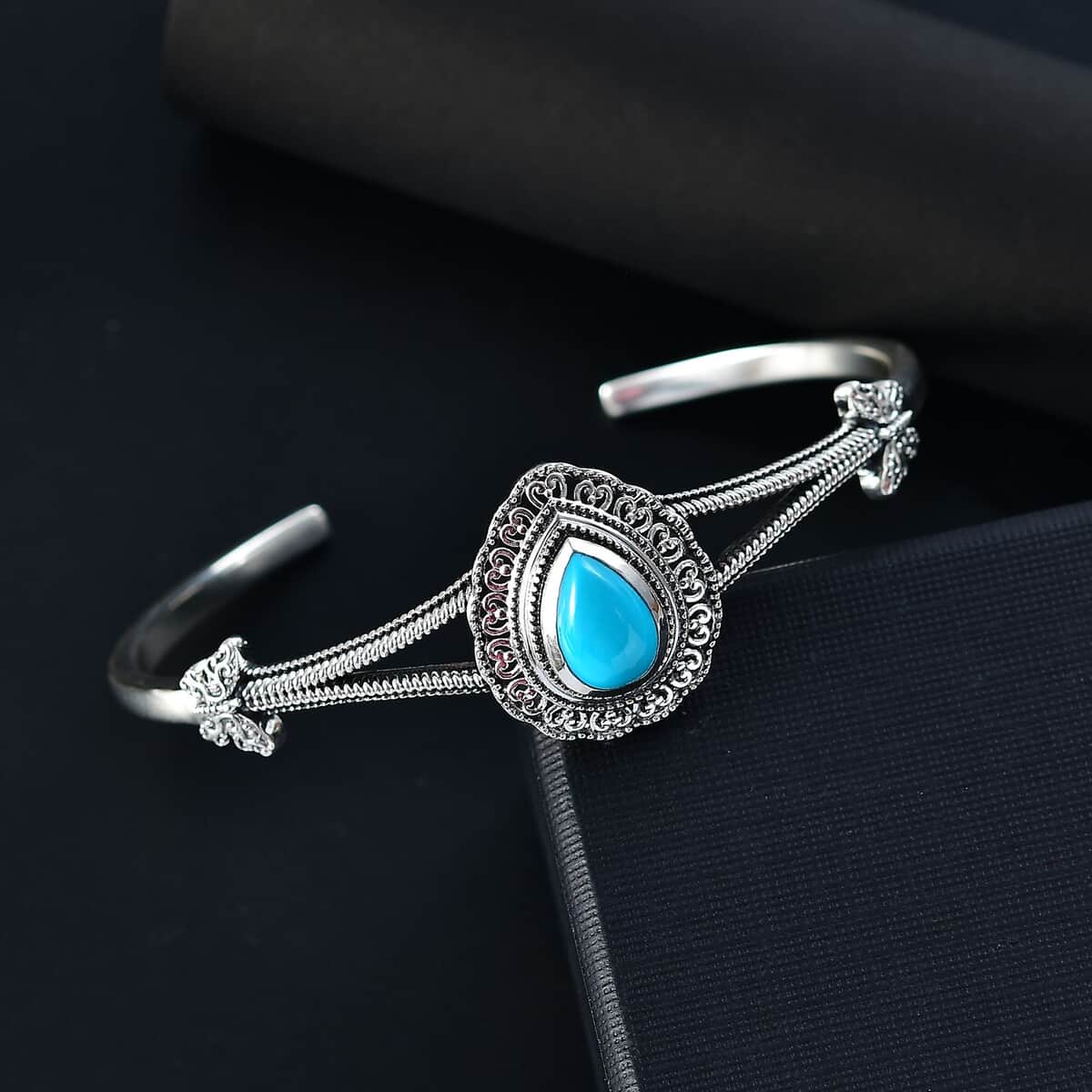 Artisan Crafted Sleeping Beauty Turquoise 2.80 ctw Elegance Butterfly Cuff Bracelet in Black Oxidized Sterling Silver (7.25 In) image number 1