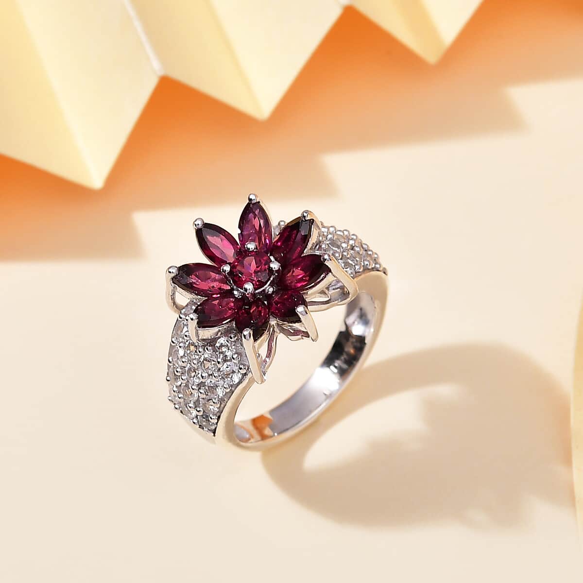 Premium Orissa Rhodolite Garnet and White Zircon 5.00 ctw Flower Ring in Rhodium Over Sterling Silver (Size 10.0) image number 1