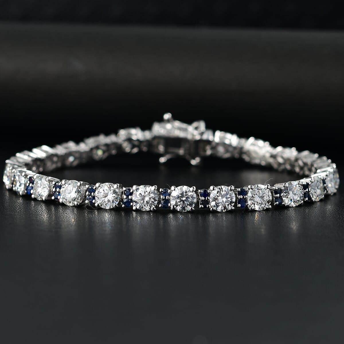 Moissanite and Madagascar Blue Sapphire 10.35 ctw Moonlit Tennis Bracelet in Rhodium Over Sterling Silver (6.50 In) image number 1