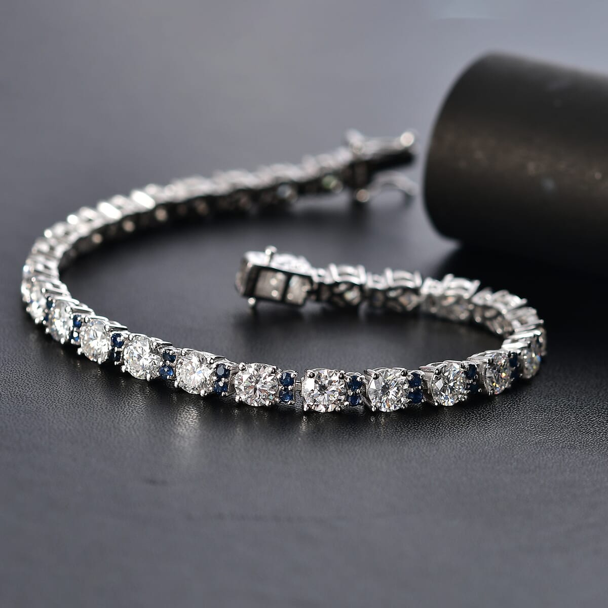 Moissanite and Madagascar Blue Sapphire 12.70 ctw Moonlit Tennis Bracelet in Rhodium Over Sterling Silver (8.00 In) image number 1