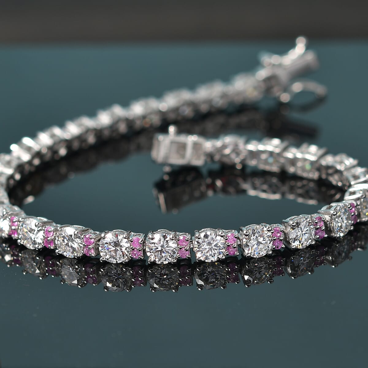 Moissanite and Madagascar Pink Sapphire 13.25 ctw Moonlit Tennis Bracelet in Rhodium Over Sterling Silver (8.00 In) image number 1