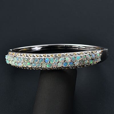 Ethiopian Welo Opal 4.35 ctw Aurora Cascade Bangle Bracelet in 18K Vermeil YG and Rhodium Over Sterling Silver (6.50 In)