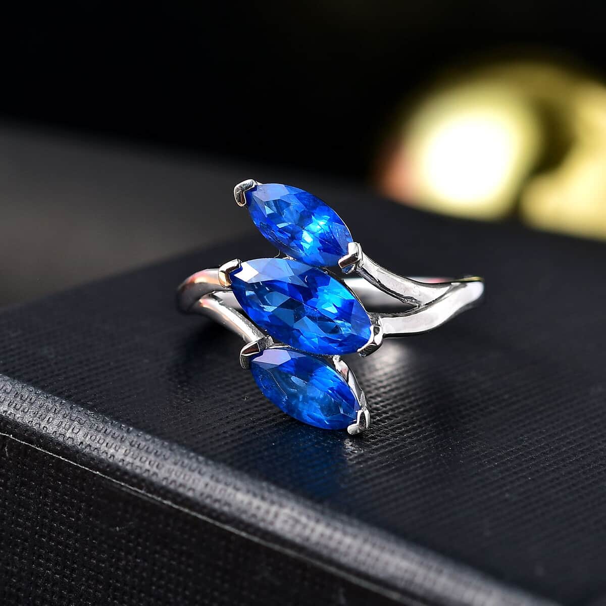 Signity Electric Blue Topaz 3 Stone Ring in Platinum Over Sterling Silver (Size 6.0) 2.40 ctw image number 1