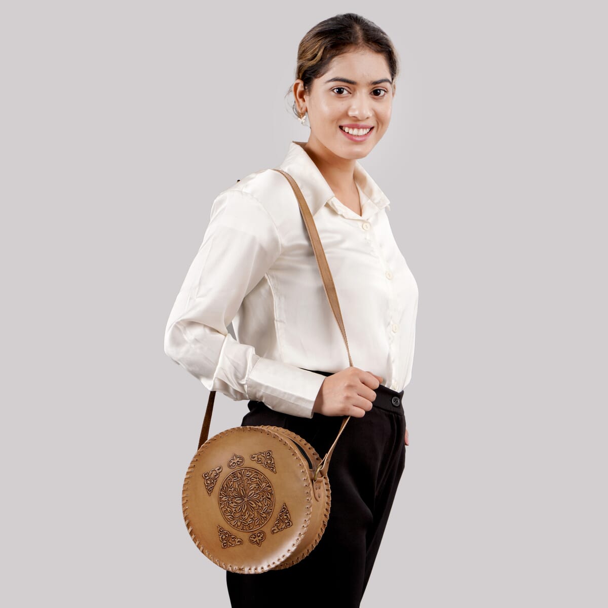 Tan Flower Pattern Genuine Leather Round Embossed Sling Bag with Adjustable Shoulder Strap (10"x3.5") image number 4