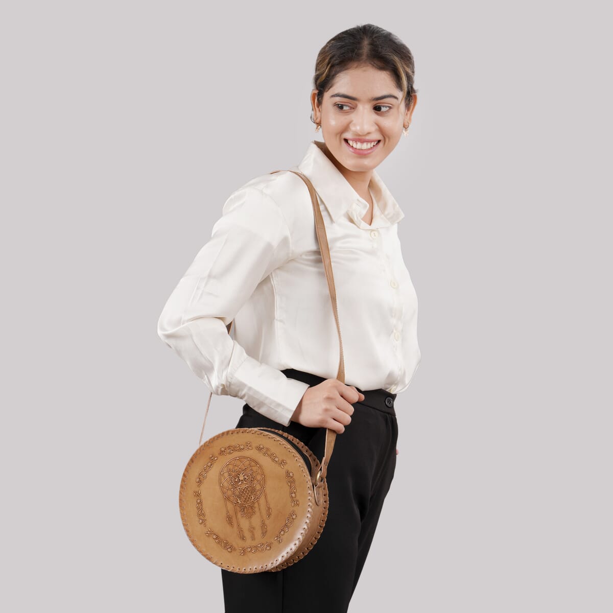 Tan Dreamcatcher Pattern Genuine Leather Round Embossed Sling Bag with Adjustable Shoulder Strap (10x3.5) image number 1