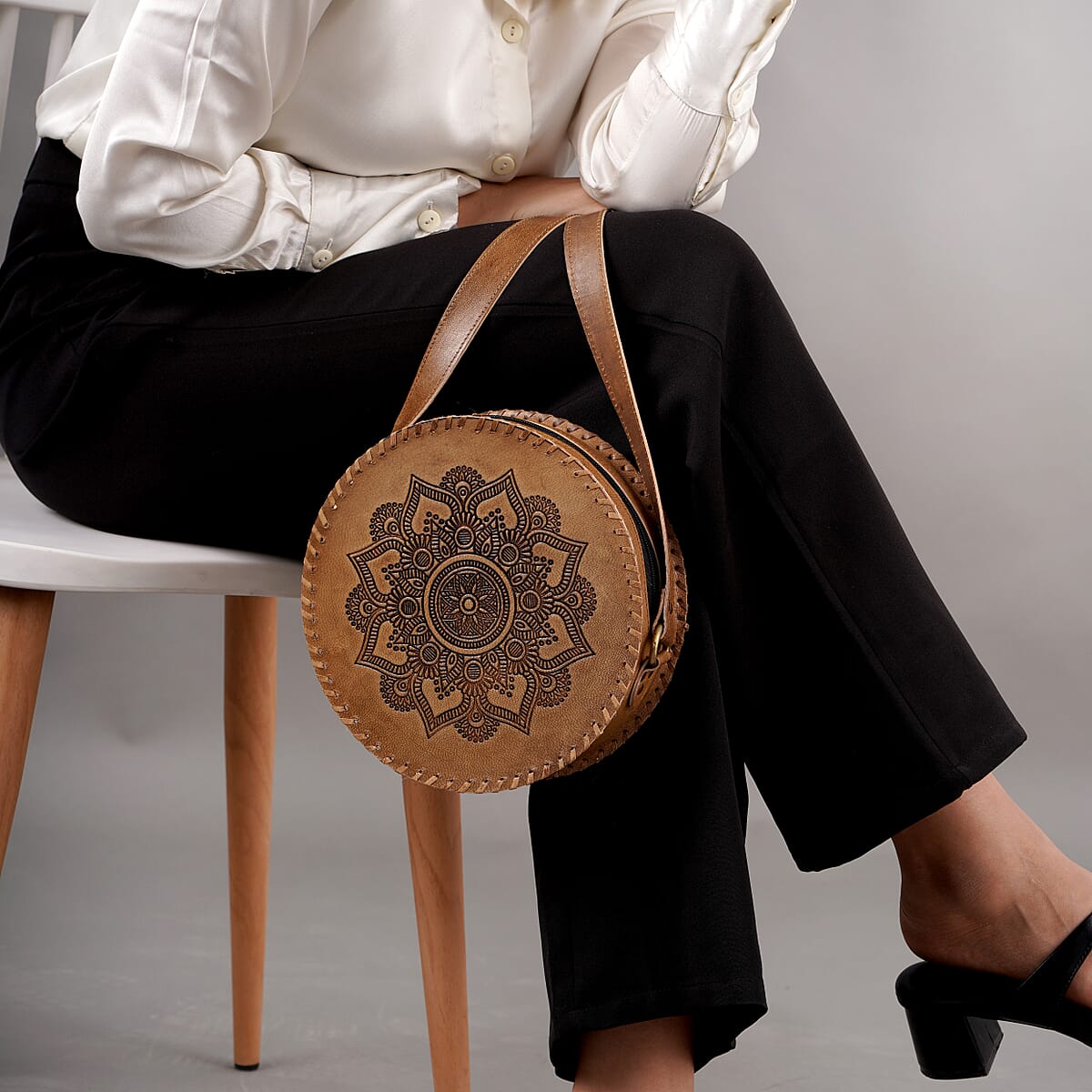 Tan Floral Pattern Genuine Leather Round Embossed Sling Bag with Adjustable Shoulder Strap image number 5