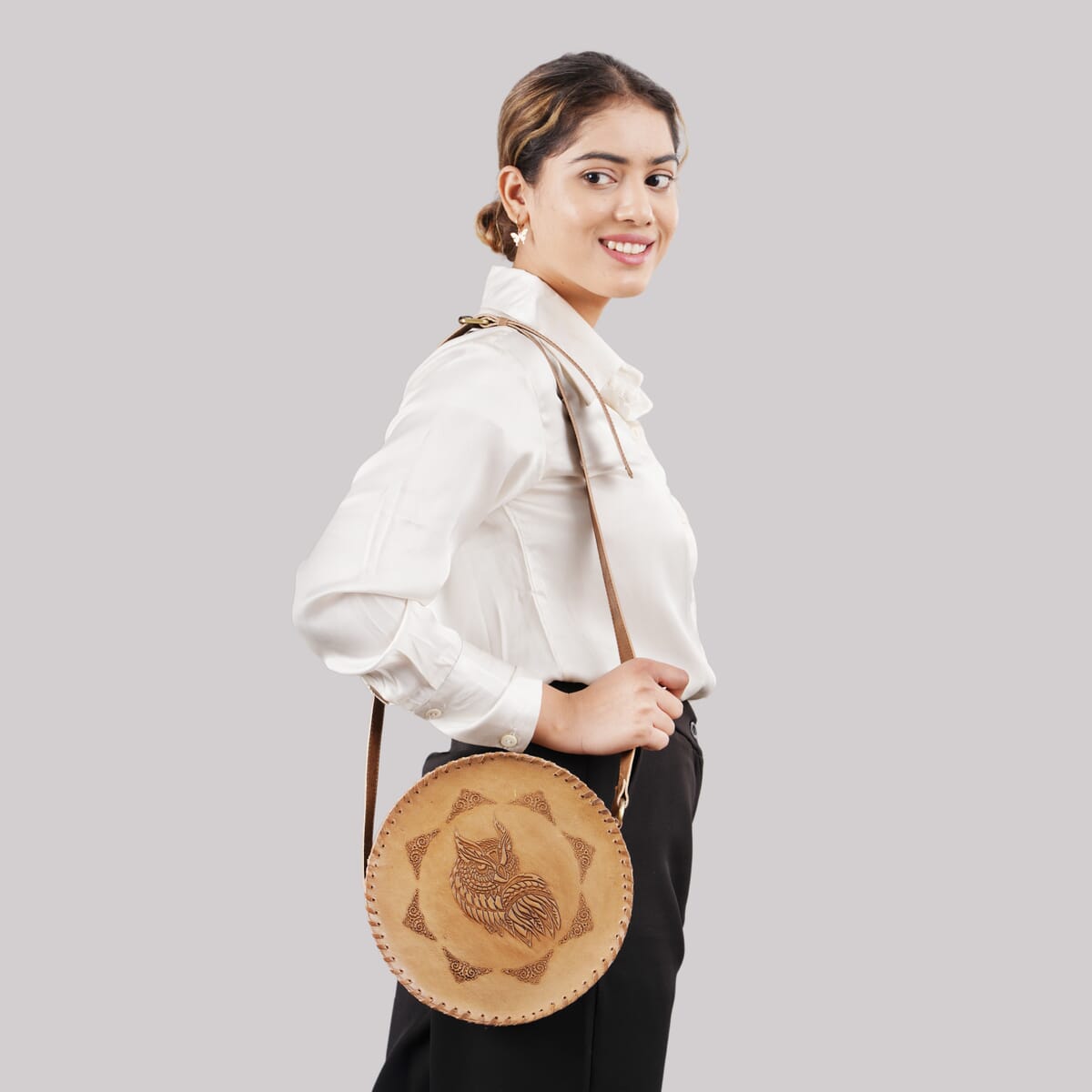 Tan Owl Pattern Genuine Leather Round Embossed Sling Bag with Adjustable Shoulder Strap image number 1