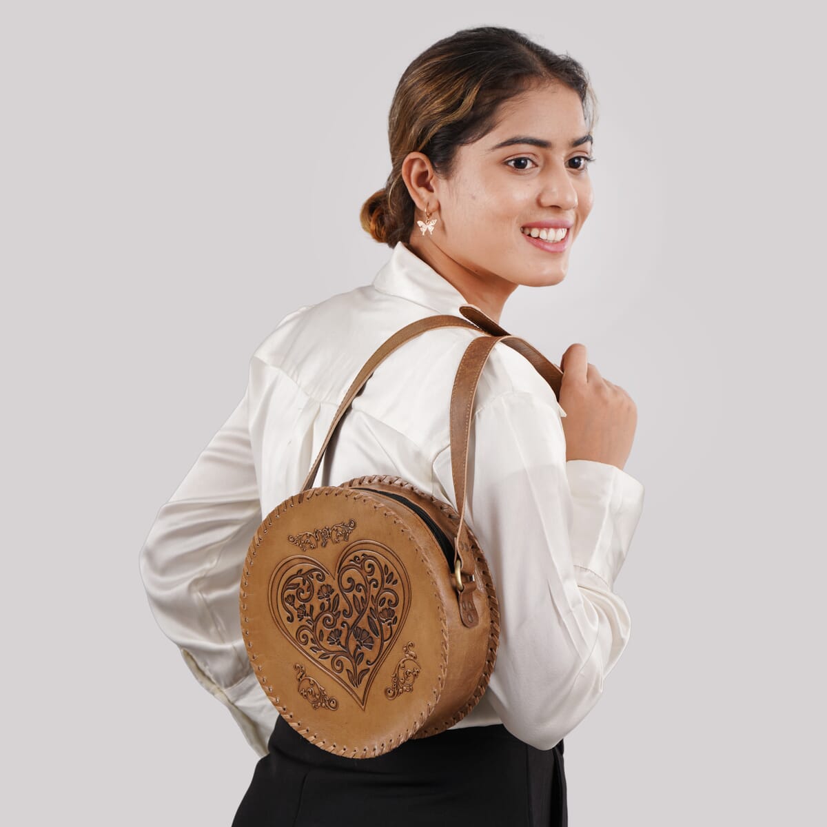 Tan Heart Pattern Genuine Leather Round Embossed Sling Bag with Adjustable Shoulder Strap image number 4