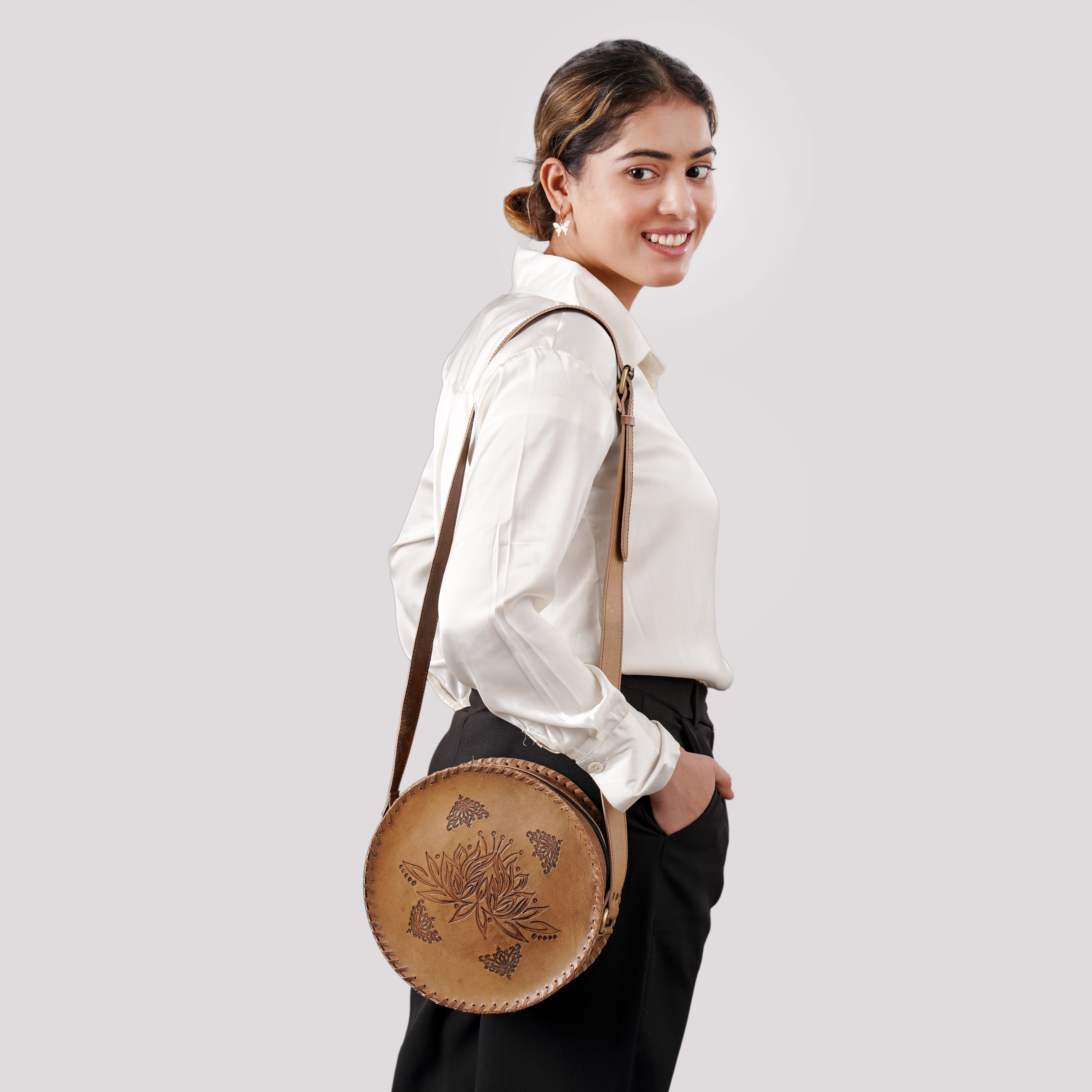 Tan Lotus Pattern Genuine Leather Round Embossed Sling Bag with Adjustable Shoulder Strap