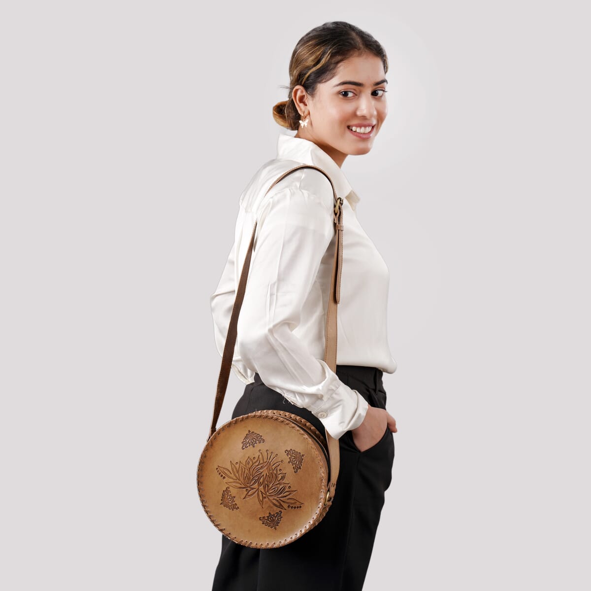 Tan Lotus Pattern Genuine Leather Round Embossed Sling Bag with Adjustable Shoulder Strap image number 1