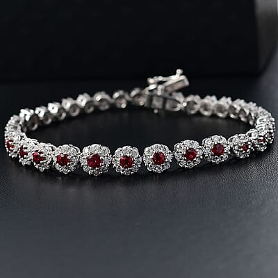 D'Joy Premium Red Sapphire and Moissanite 7.40 ctw Floral Halo Bracelet in Rhodium Over Sterling Silver (8.00 In)