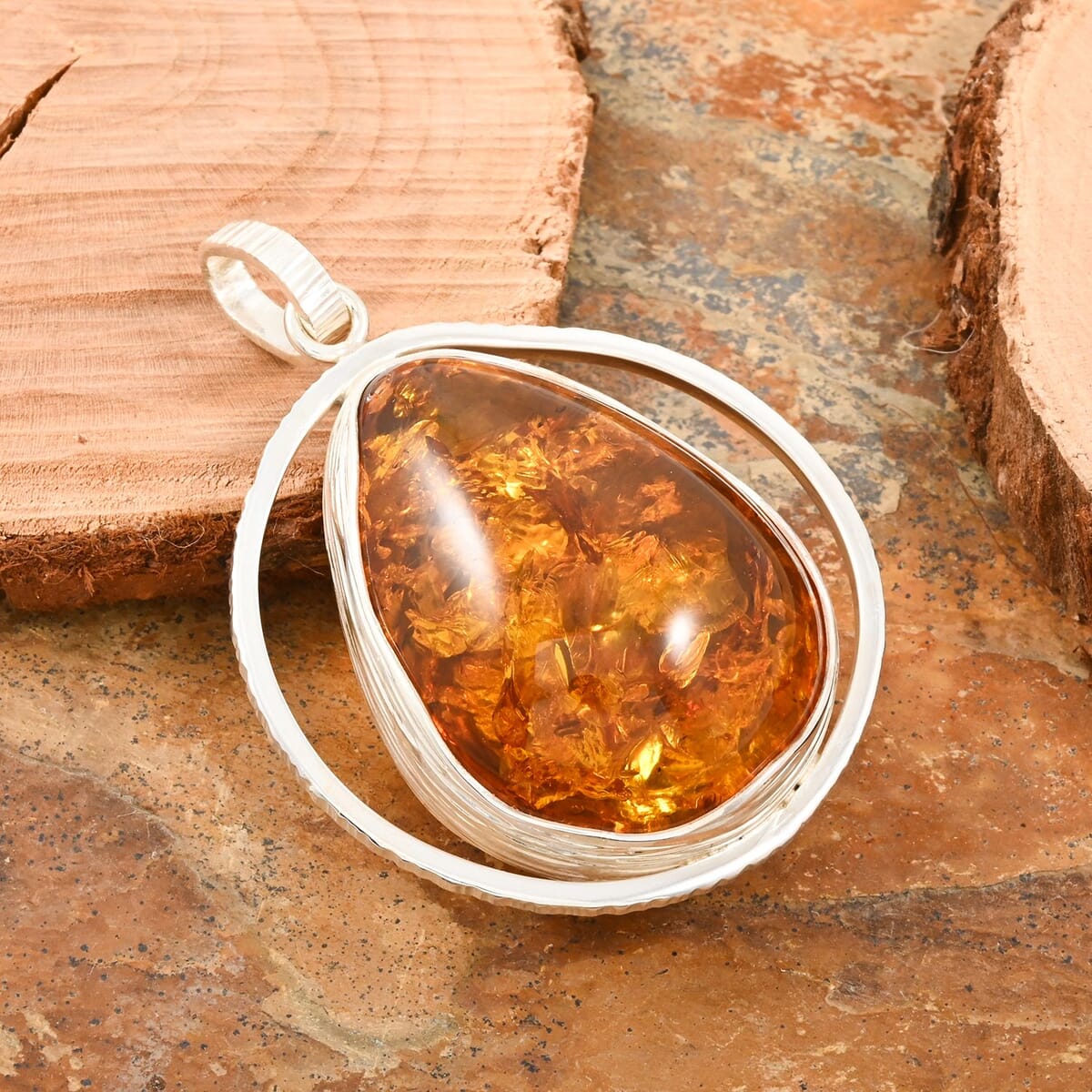 Baltic Amber Drop Shape Designer Pendant in Sterling Silver image number 1