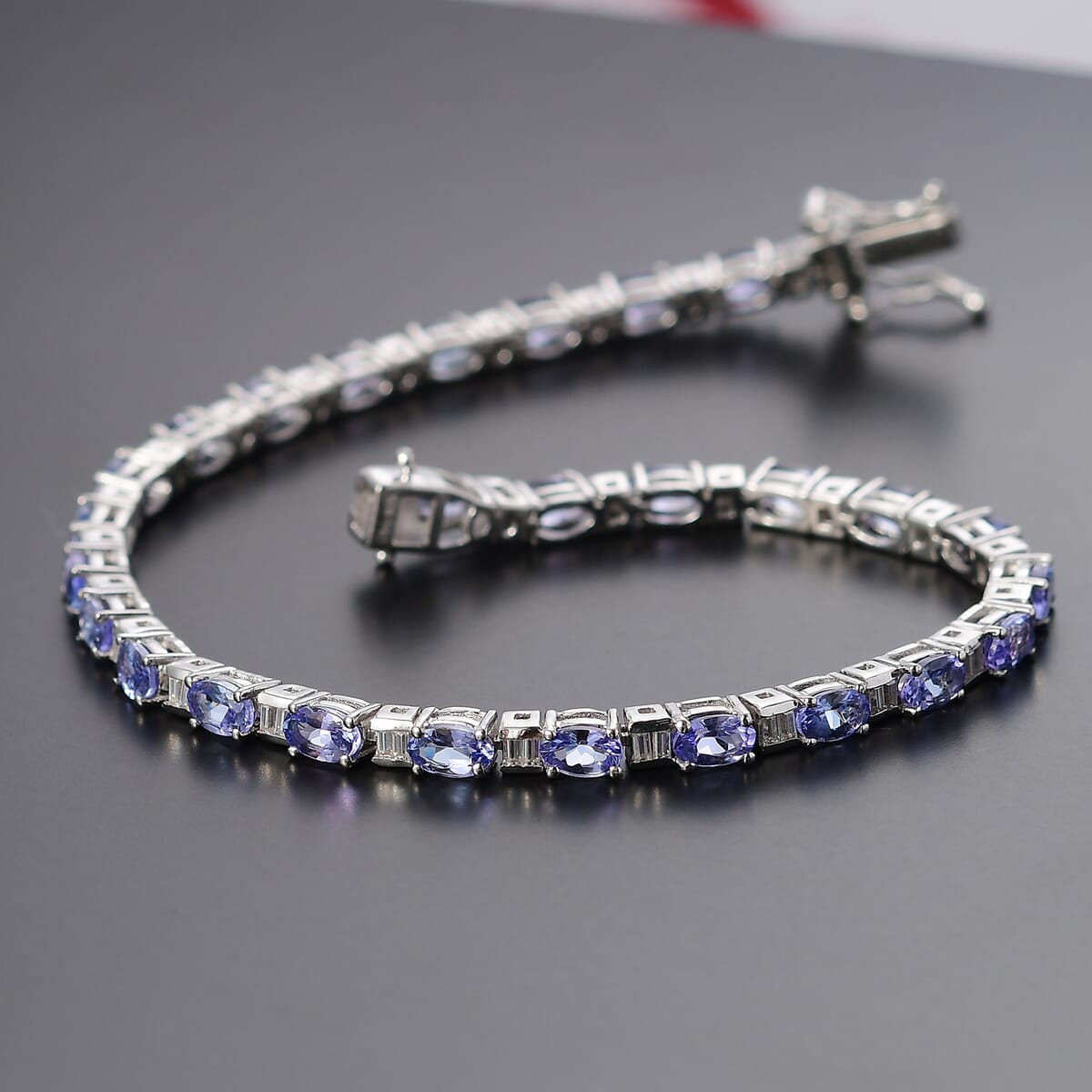 Tanzanite and Moissanite 6.15 ctw Radiance Tennis Bracelet in Rhodium Over Sterling Silver (6.50 In) image number 1