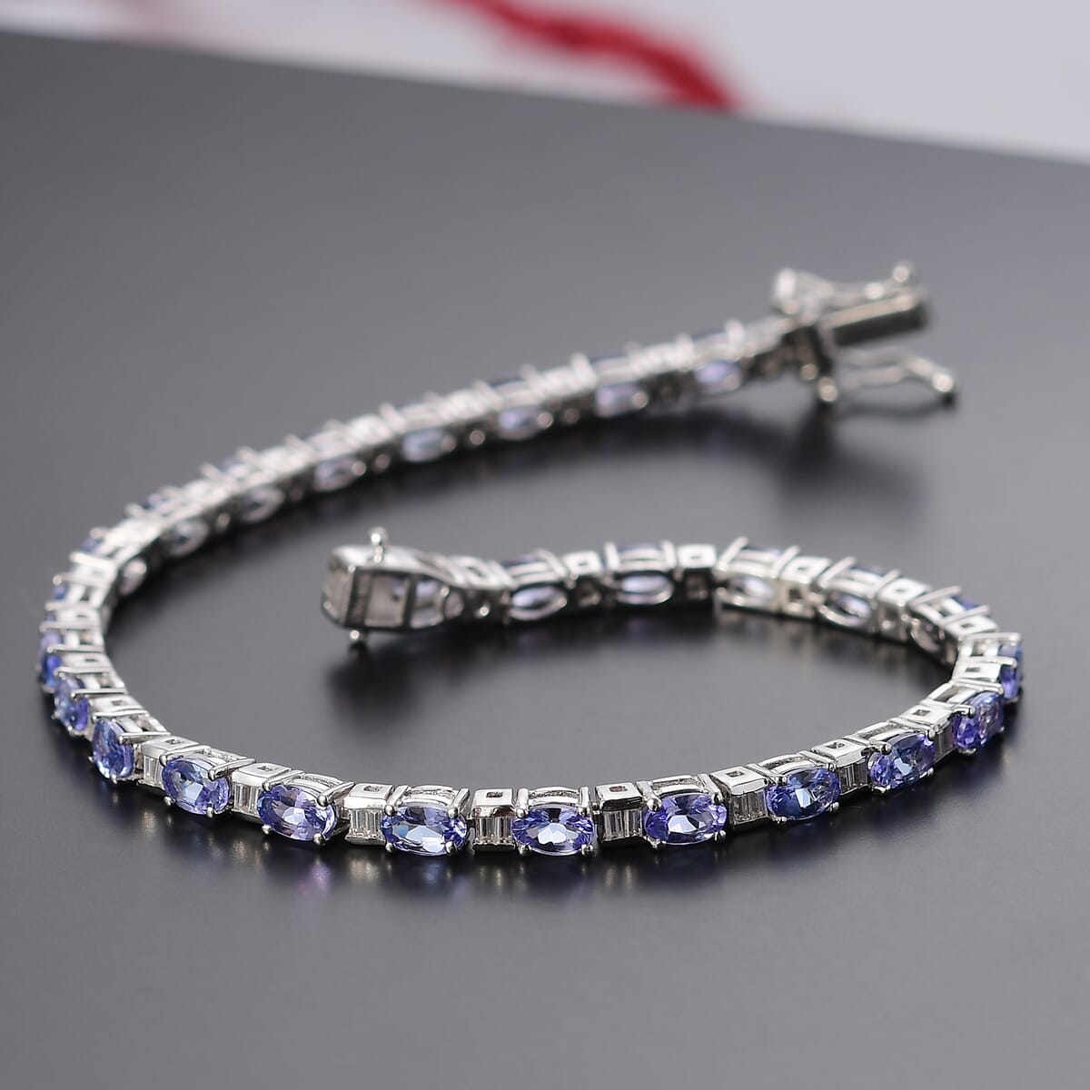 Tanzanite and Moissanite 7.50 ctw Radiance Tennis Bracelet in Rhodium Over Sterling Silver (8.00 In) image number 1