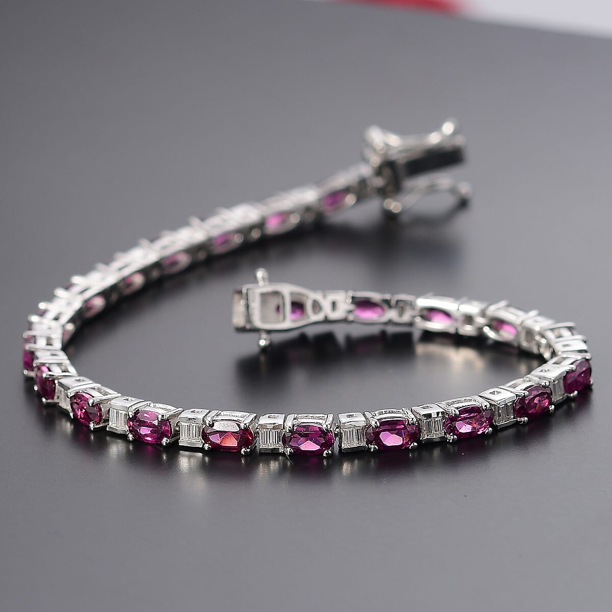 Radiant Ember Garnet and Moissanite 7.65 ctw Radiance Tennis Bracelet in Rhodium Over Sterling Silver (6.50 In) image number 1