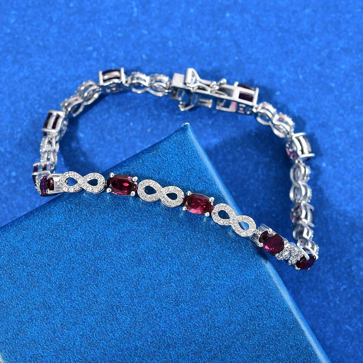 Premium Orissa Rhodolite Garnet and White Zircon 8.00 ctw Infinity Love Bracelet in Rhodium Over Sterling Silver (7.25 In) image number 1