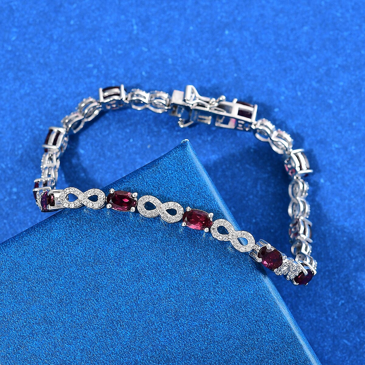 Premium Orissa Rhodolite Garnet and White Zircon 7.30 ctw Infinity Love Bracelet in Rhodium Over Sterling Silver (6.50 In) image number 1