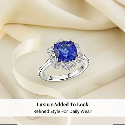 Certified and Appraised Rhapsody AAAA Tanzanite and E-F VS Diamond 4.25 ctw Ring in 950 Platinum (Size 10.0) 7.65 Grams