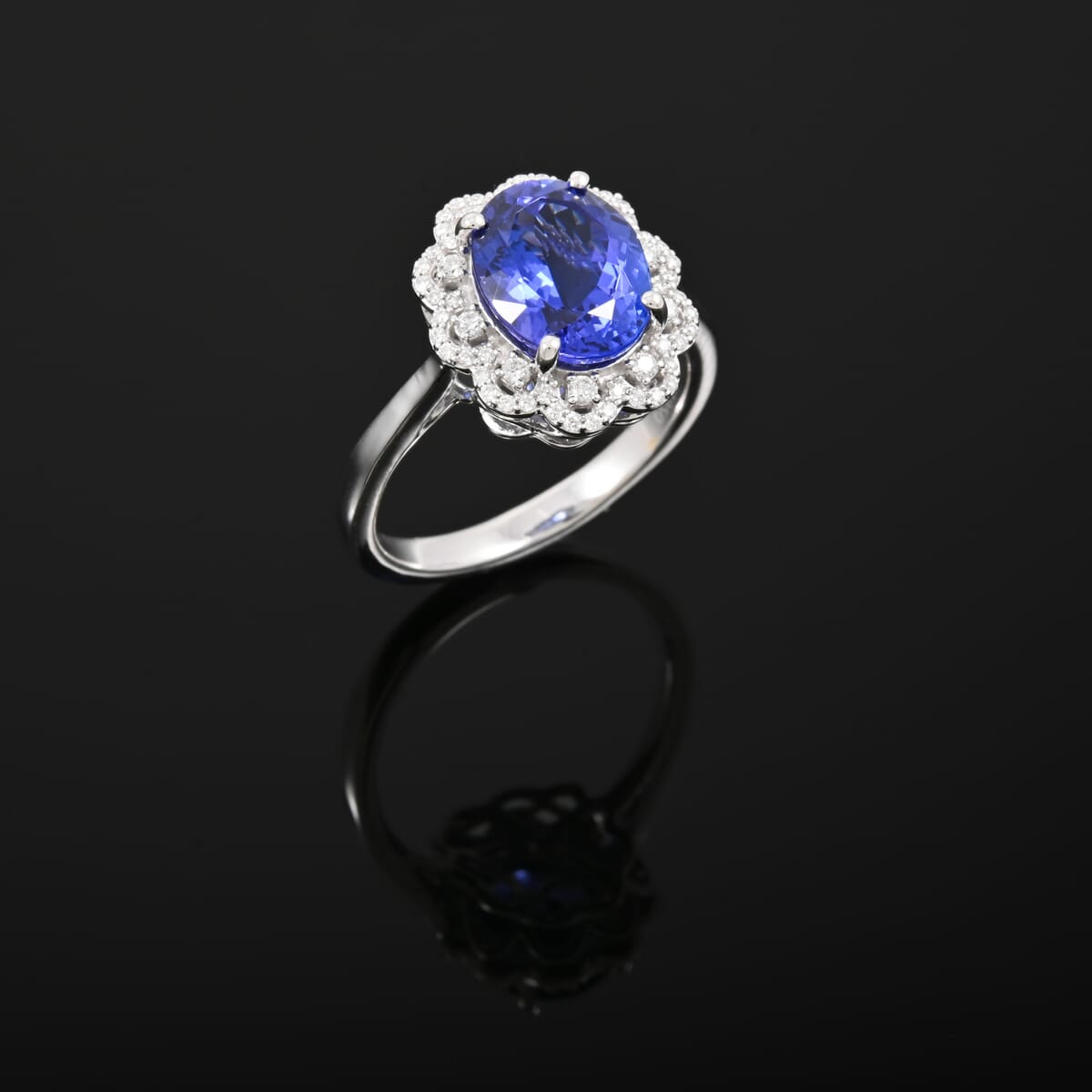 Certified and Appraised Rhapsody 950 Platinum AAAA Tanzanite and E-F VS Diamond 4.25 ctw Ring (Size 6.0) 7.38 Grams image number 1