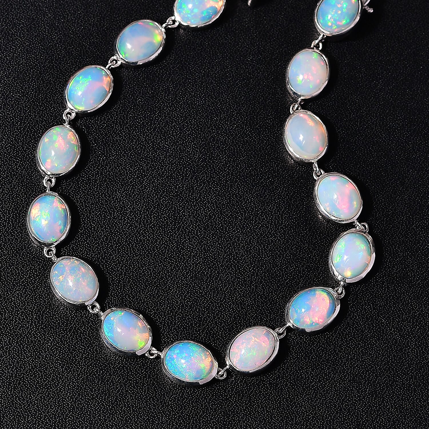 D'Joy Premium Ethiopian Welo Opal 16.00 ctw Seahorse Bracelet in Rhodium Over Sterling Silver (7.25 In)