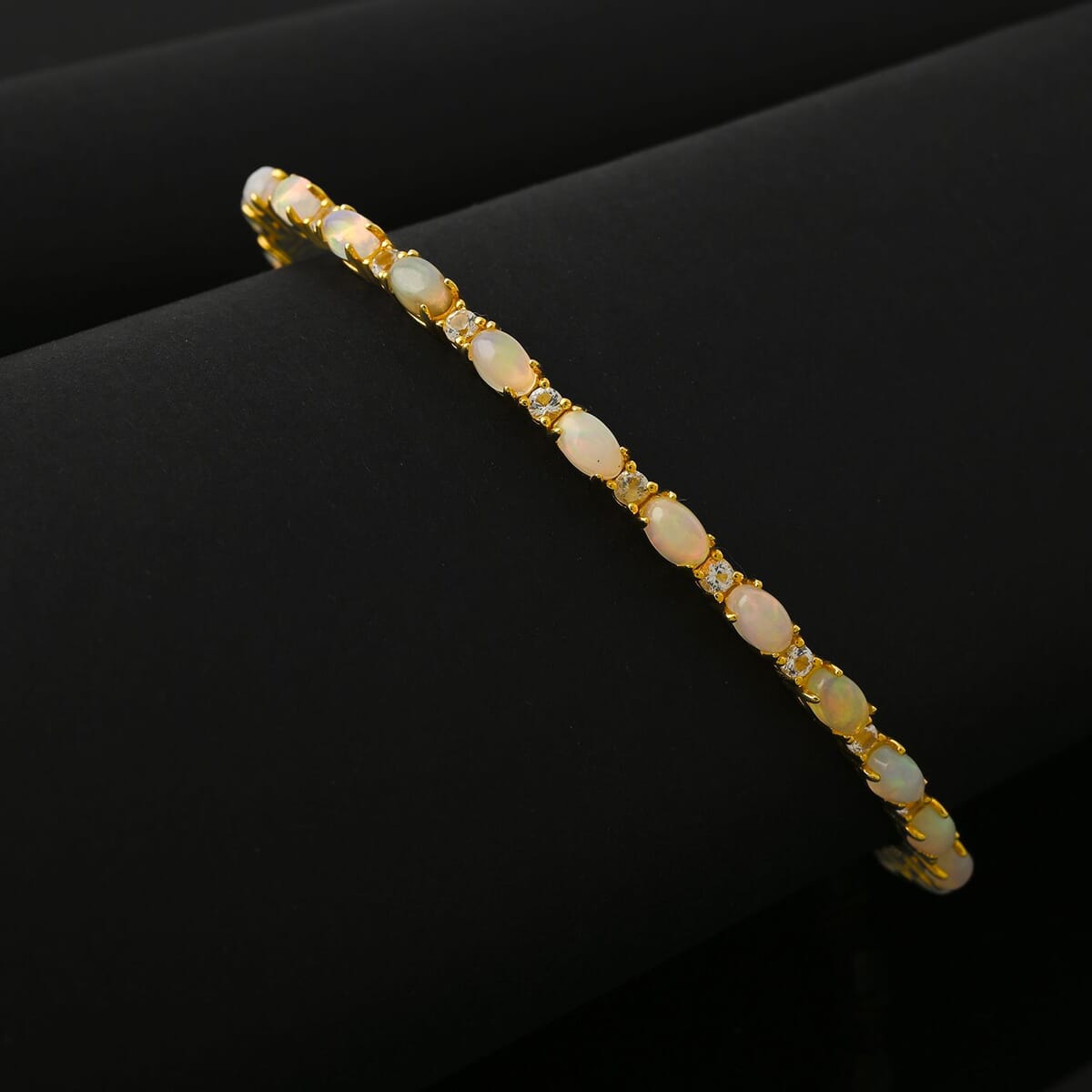 Modani Opal and White Topaz 5.50 ctw Bangle Bracelet (7.25 in) in Vermeil YG Over Sterling Silver with with 1.5g Titanium Spring image number 1
