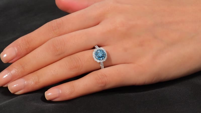 Luxuriant Lab Grown Blue and White Diamond Serene Halo Ring in Sterling Silver