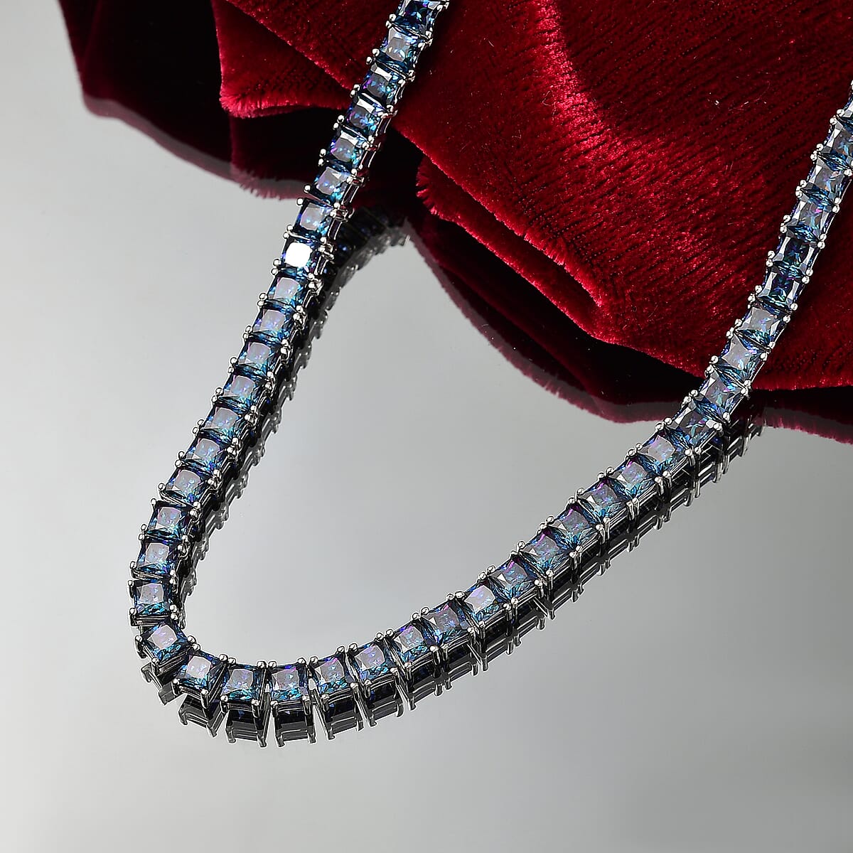 J Francis Embellished with Rainbow Blue Zirconia by Swarovski 101.00 ctw Iconic Tennis Necklace 18 Inches in Rhodium Over Sterling Silver image number 1