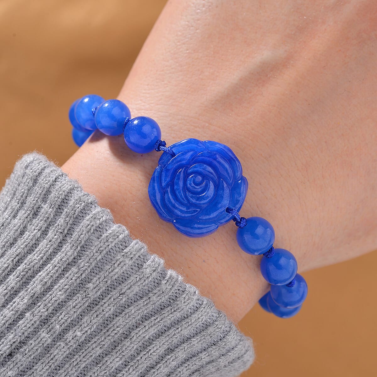 Blue Jade (D) 105.00 ctw Beaded with Carved Flower Bracelet (6-9In) image number 1