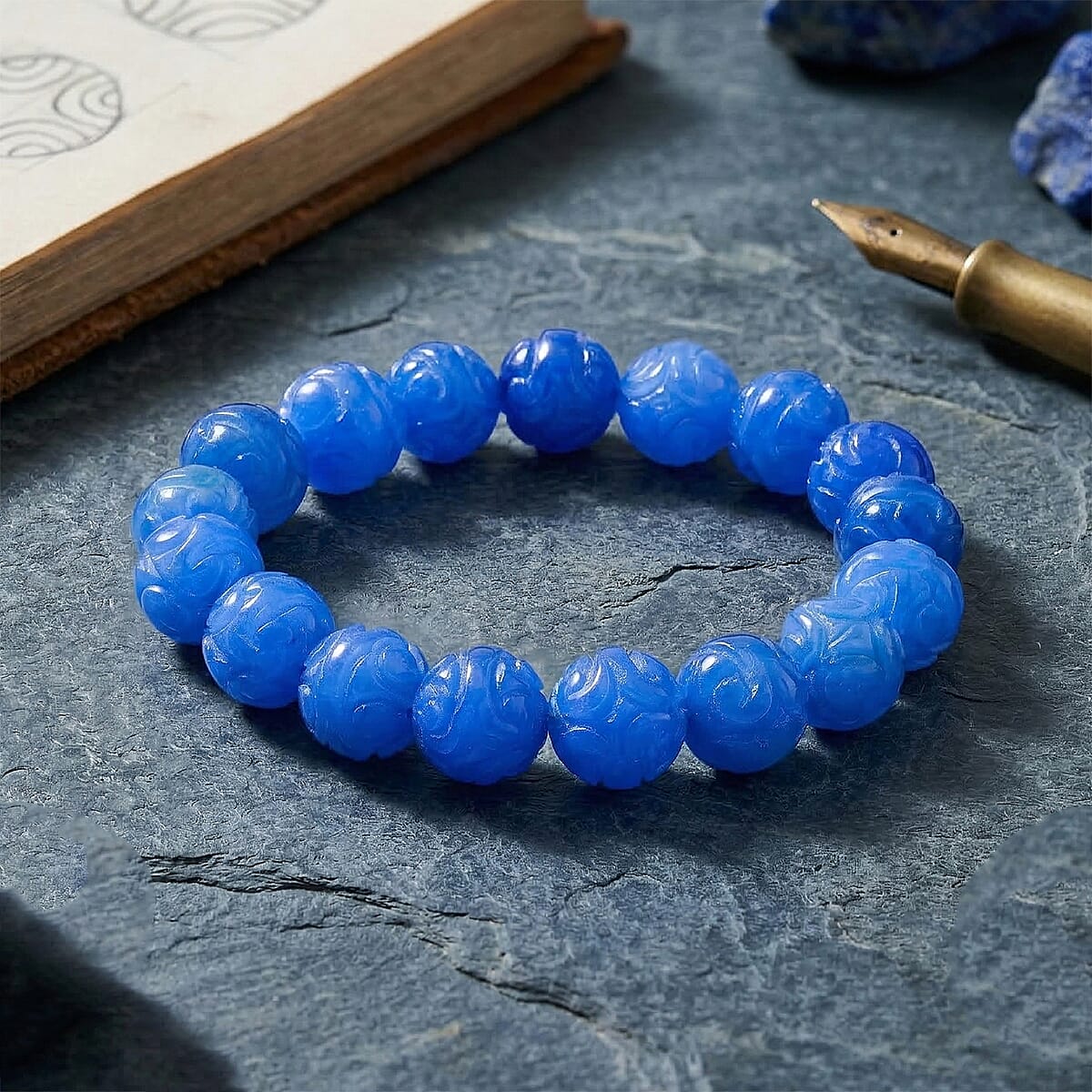 Blue Jade 235.00 ctw Carved Beaded Stretch Bracelet (6.5-7In) image number 1