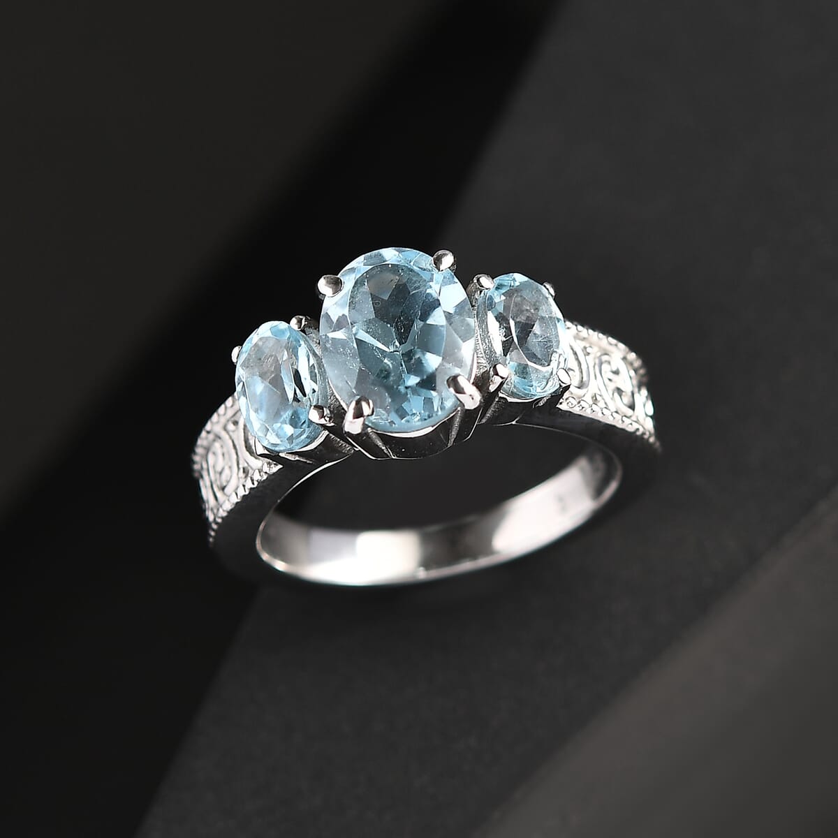 Sky Blue Topaz 3.70 ctw 3 Stone Ring in Stainless Steel (Size 8.0) image number 1