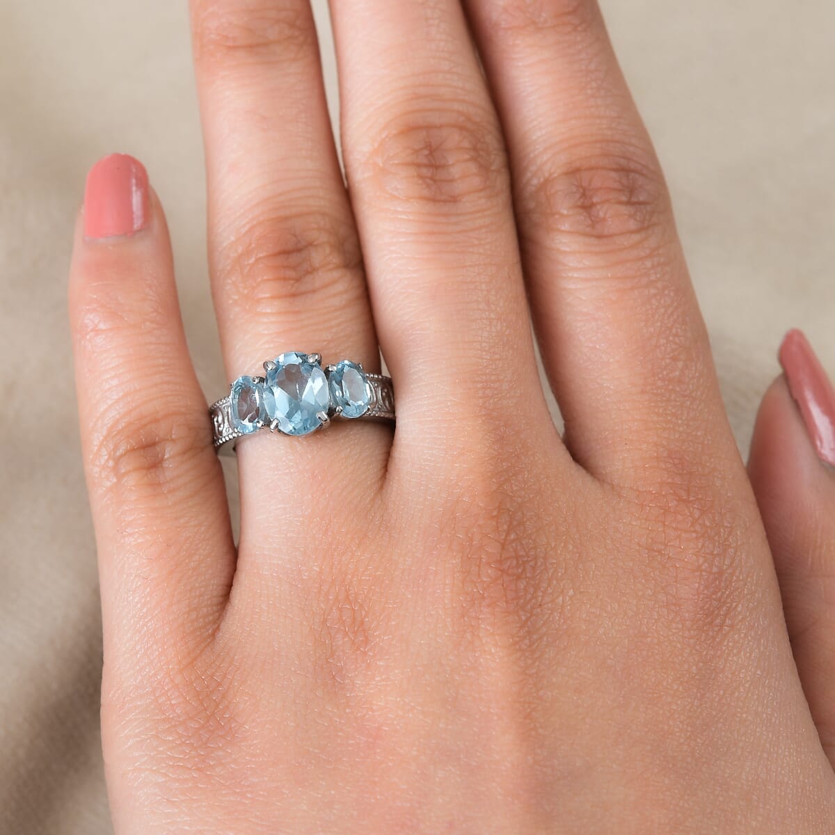 Sky Blue Topaz 3.70 ctw 3 Stone Ring in Stainless Steel (Size 8.0) image number 2