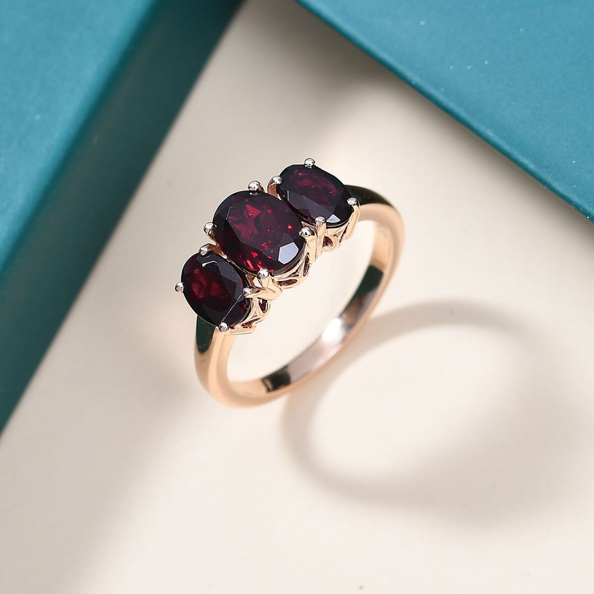 Luxoro Premium Anthill Garnet 3.40 ctw Trilogy Ring in 10K Rose Gold (Size 6.0) image number 1