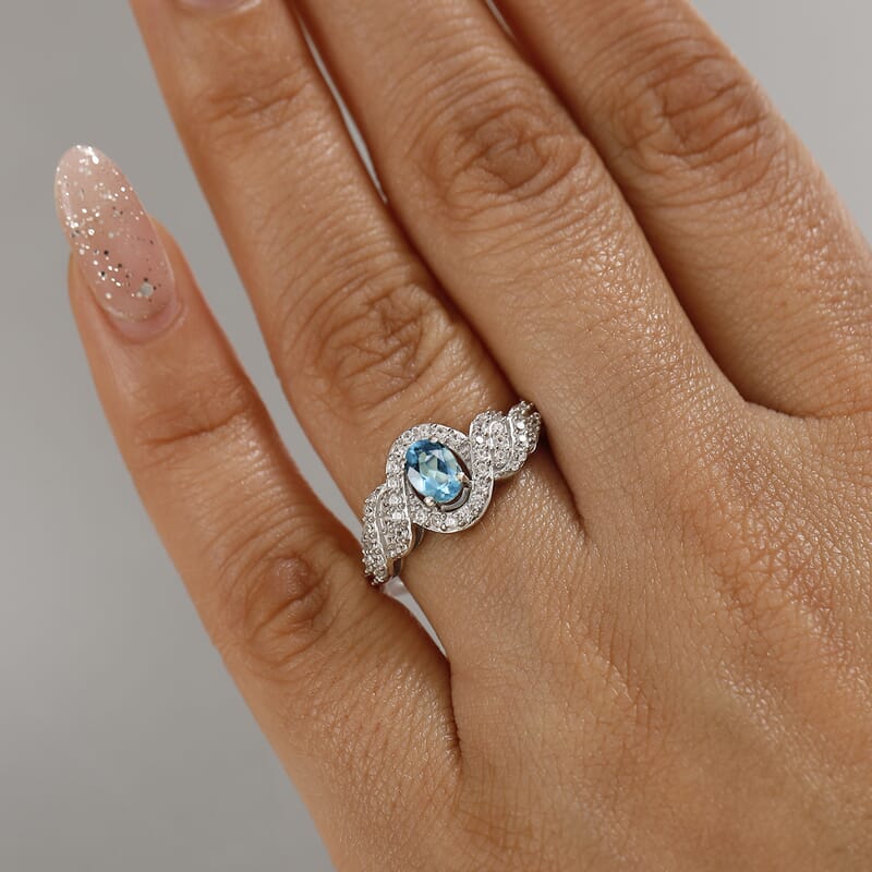 D'Joy Premium Betroka Blue Apatite and White Zircon 1.10 ctw Swirl Infinity Sparkle Ring in Rhodium Over Sterling Silver (Size 10.0)