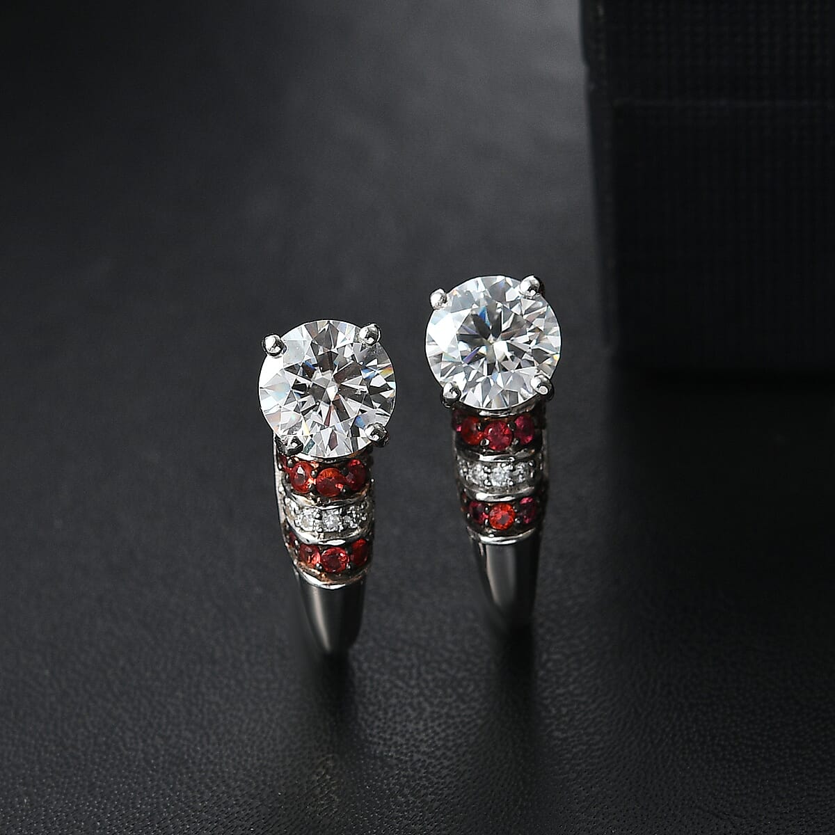 D'Joy Heart and Arrow Cut Moissanite and Red Sapphire 2.90 ctw Moonlit Grace Earrings in Rhodium Over Sterling Silver image number 1