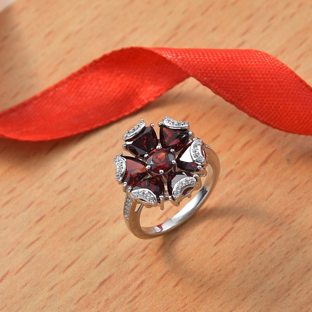 Mozambique Garnet and White Zircon 6.35 ctw Fiery Blossom Ring in Rhodium Over Sterling Silver (Size 6.0) image number 1
