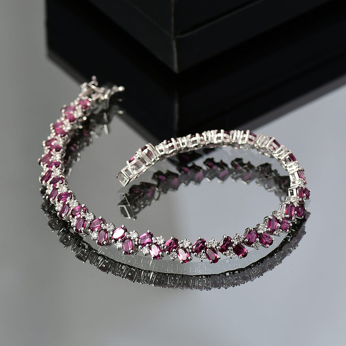 D'Joy Radiant Ember Garnet and White Zircon 14.40 ctw Sea Waves Bracelet in Rhodium Over Sterling Silver (6.50 In) image number 1