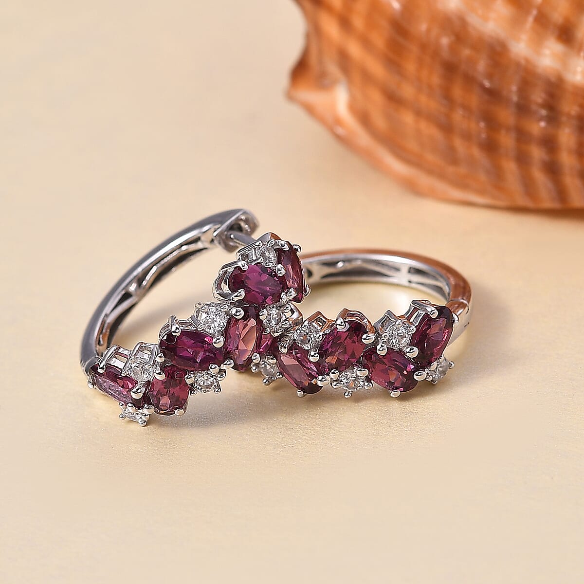 D'Joy Radiant Ember Garnet and White Zircon 4.15 ctw Sea Waves Earrings in Rhodium Over Sterling Silver image number 1