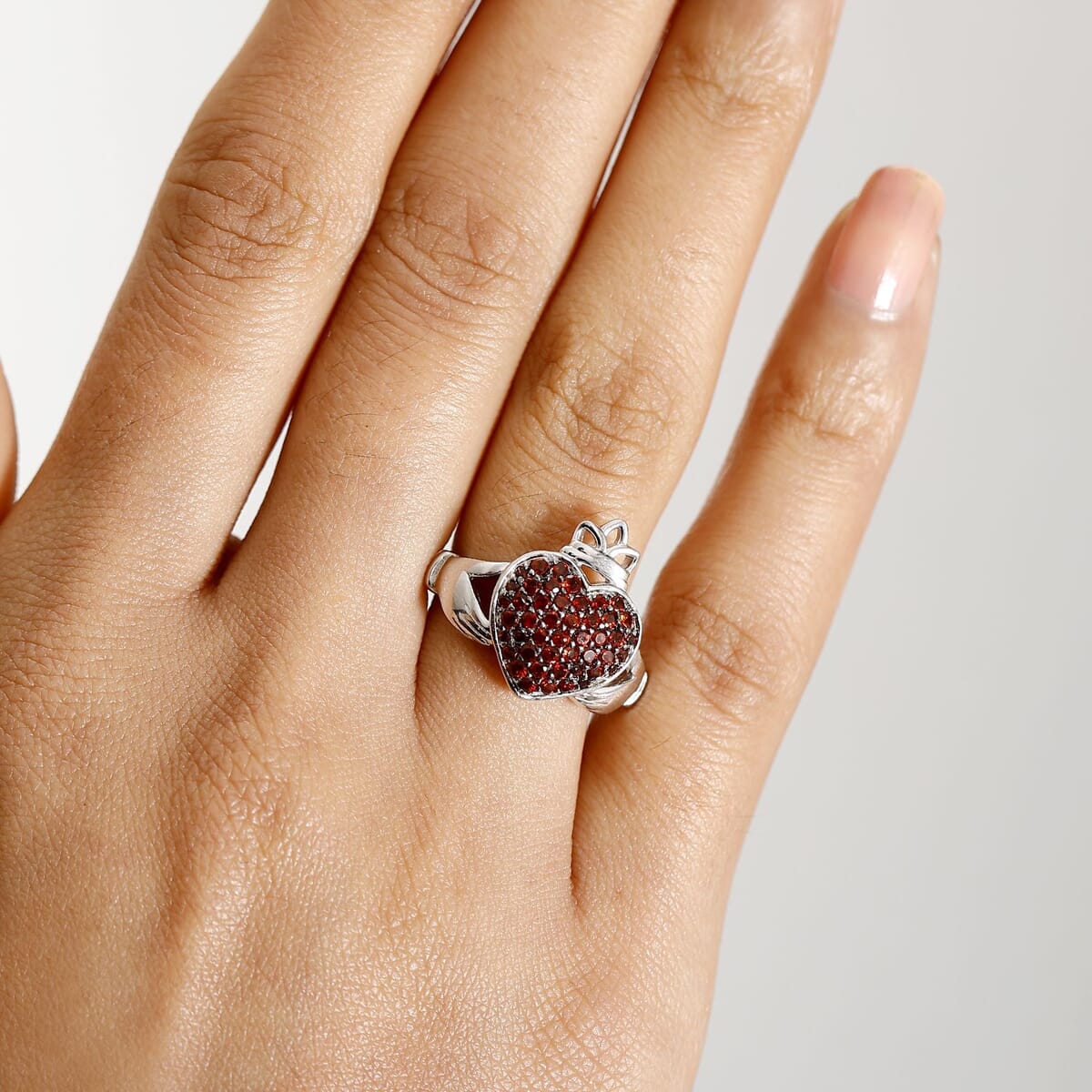 Premium Mozambique Garnet 0.80 ctw Claddagh Ring in Rhodium Over Sterling Silver (Size 7.0) image number 2