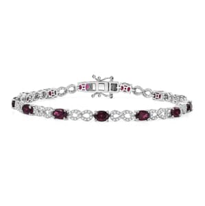 Premium Orissa Rhodolite Garnet and White Zircon 9.50 ctw Infinity Love Bracelet in Rhodium Over Sterling Silver (8.00 In)