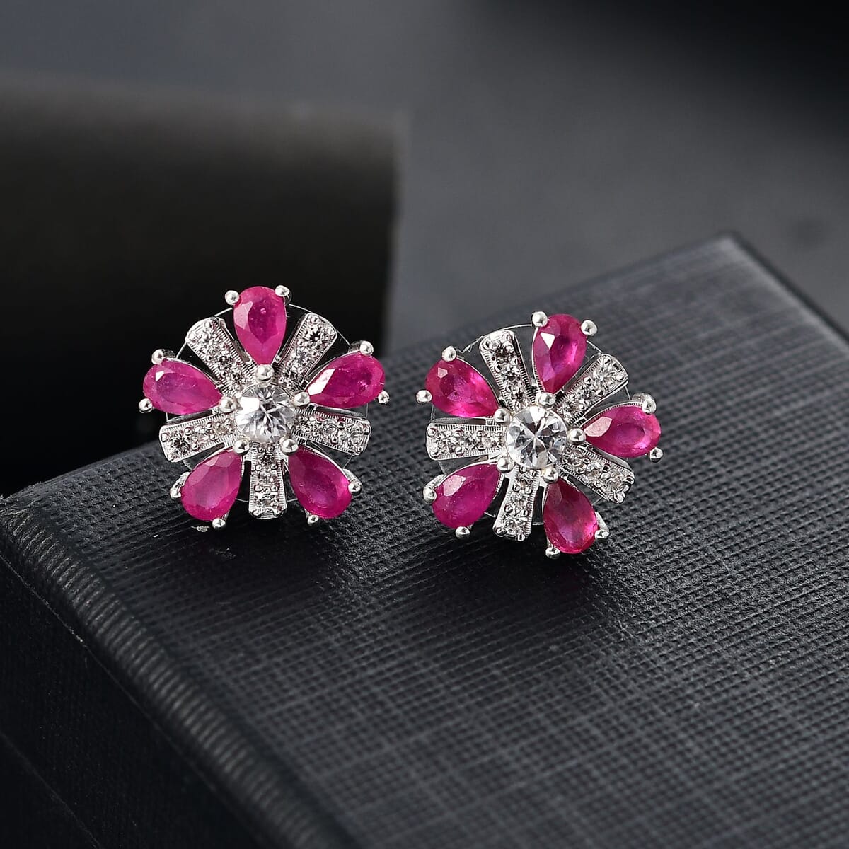 Niassa Ruby (FF) and White Zircon 3.90 ctw Floral Earrings in Rhodium Over Sterling Silver image number 1
