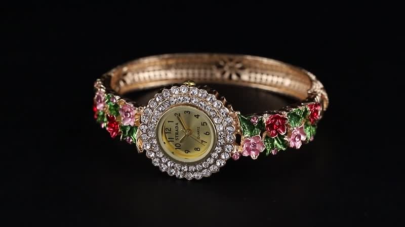 Strada Multi Color Austrian Crystal and Enameled Japanse Movement Bangle Watch in Goldtone