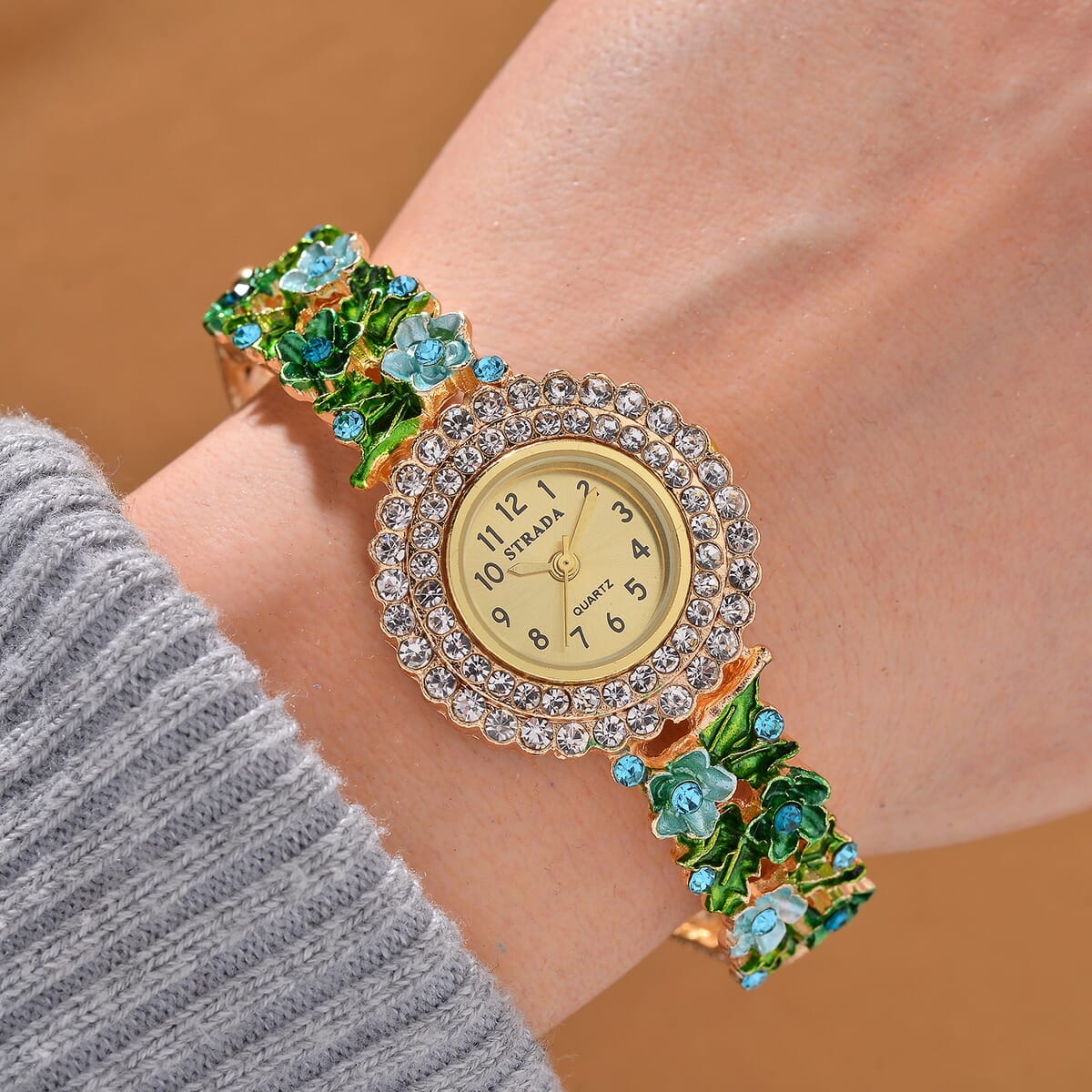 Strada White and Blue Austrian Crystal and Enameled Japanse Movement Bangle Watch in Goldtone image number 1